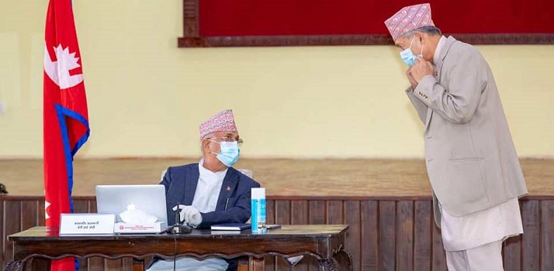 PM-Oli-and-Dr.-Yubraj-Khatiwada